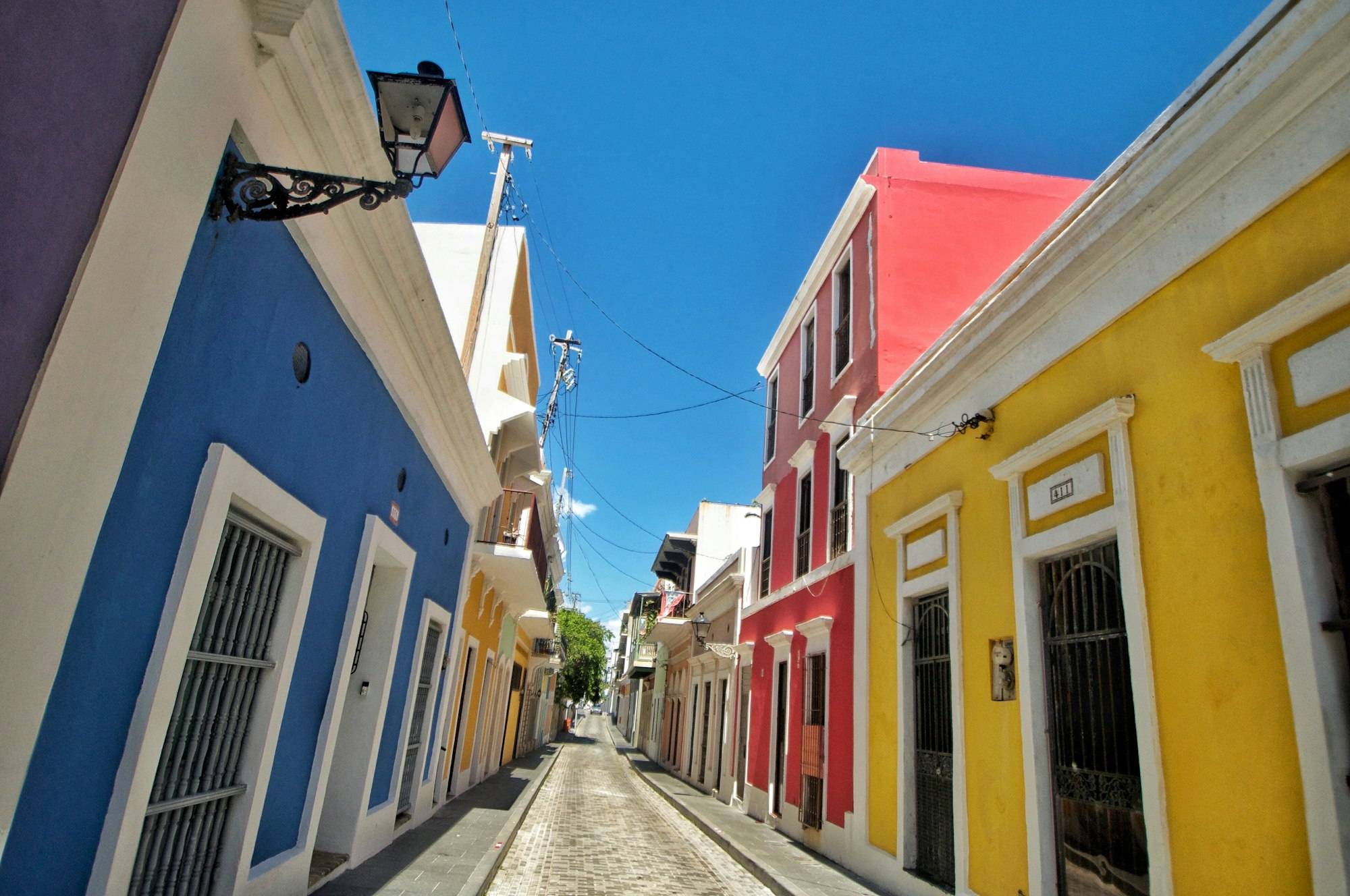 Colorful houses in a row on a calle/street In Viejo San Juan Travel