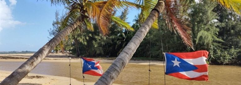 Puerto Rican flags at the beach in Puerto Rico
